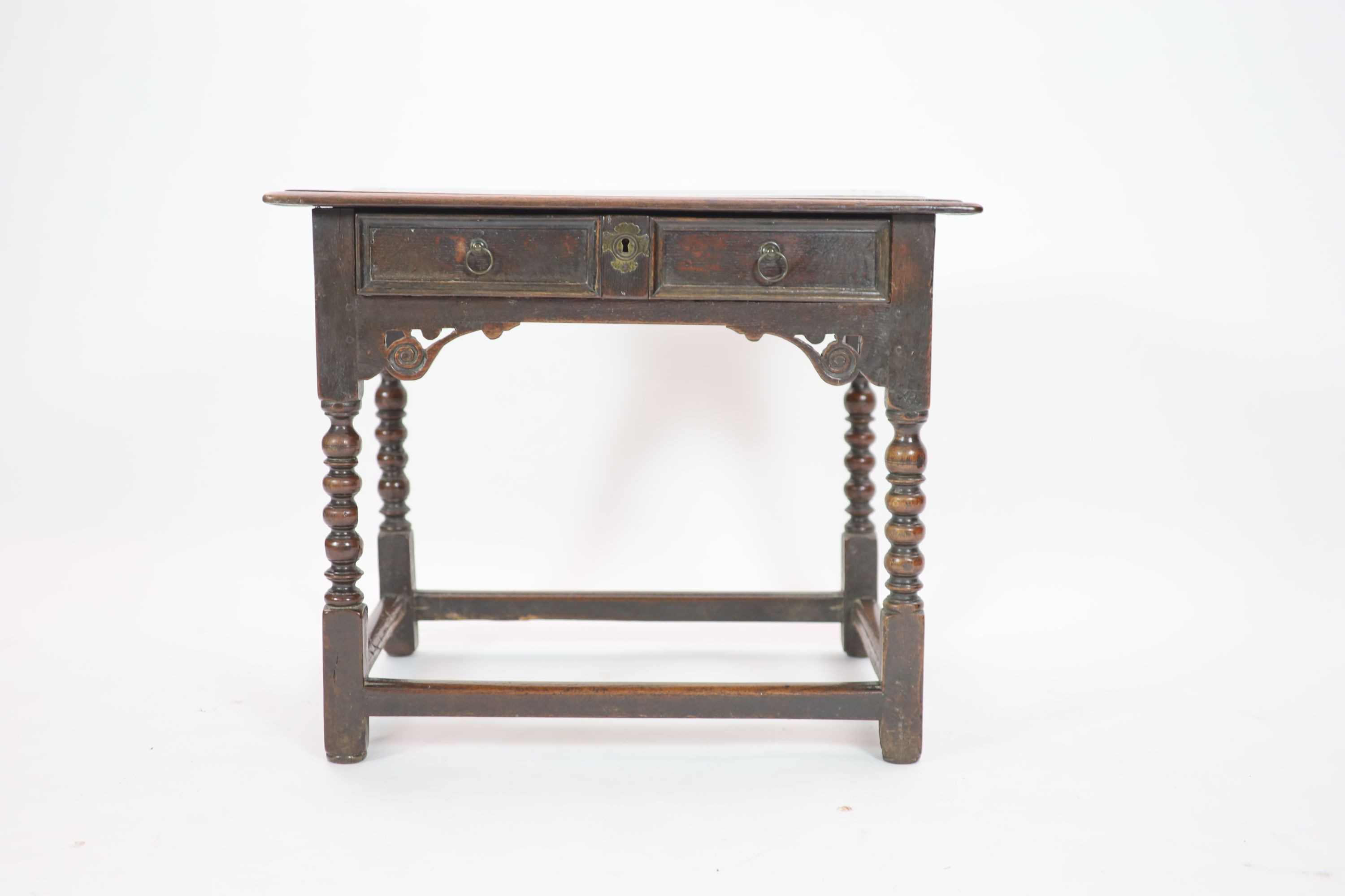 A Charles II oak side table H 68cm. W 82cm. D 56cm.